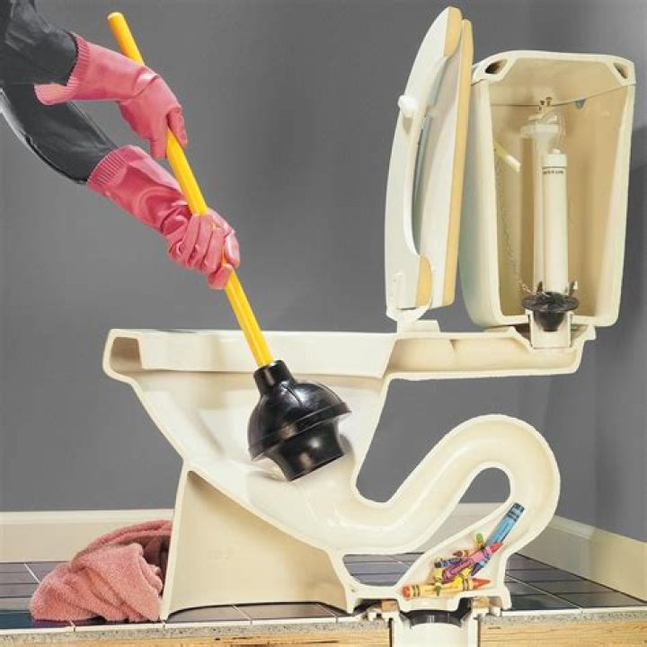 How do you unclog a toilet in an apartment